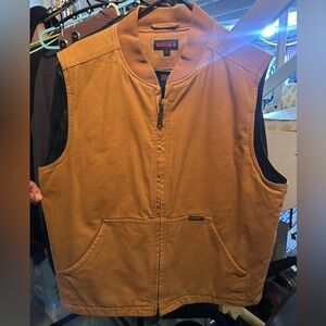 Wolverine tan vest.